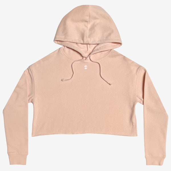 Women’s short cropped blush pink hoodie with a white micro-sized Oaklandish tree logo on the center chest.