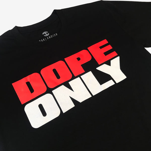 Close-up of red and white DOPEONLY wordmark logo on the chest of a black t-shirt.