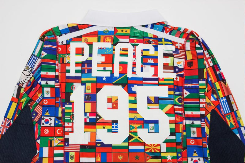 Back print of Umbro rugby jersey with all over world flag pattern and 'Peace 195' screen-printed at center. 