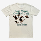 Natural cotton t-shirt saying Lake Merrit Oakland Calif. Come together. Preserve Public Spaces. Stay Town with flock of geese. 
