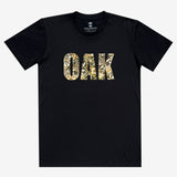 Front image of men's black t-shirt with floral pattern inside 'OAK' wordmark.