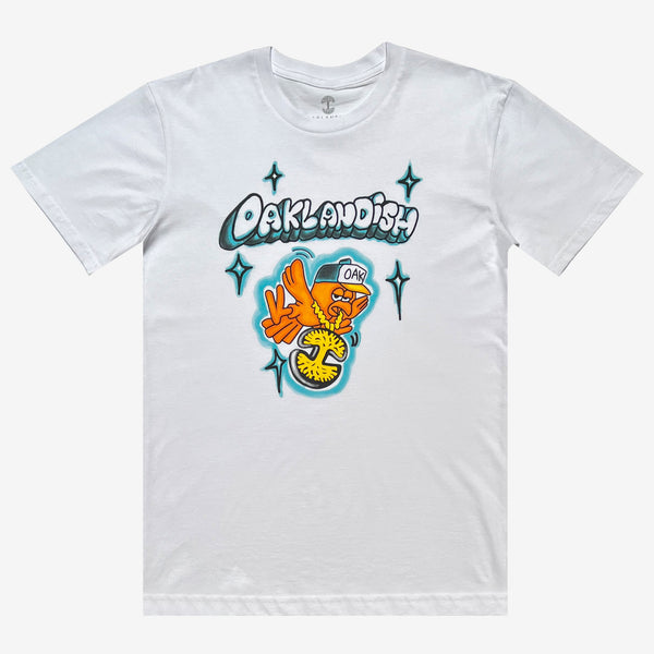 White t-shirt with a graphic image of a flying cartoon bird wearing an Oaklandish logo necklace with Oaklandish bubble wordmark above.