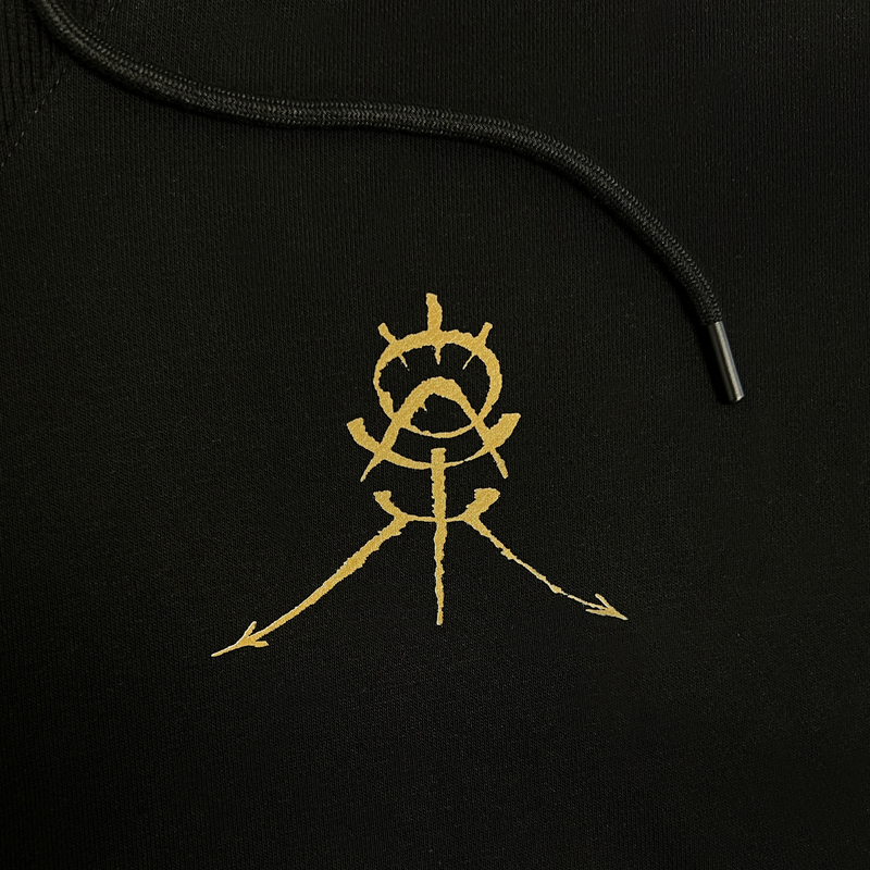 Detailed close up of GATS gold OAK monogram and drawcords with metal tips on premium black Oaklandish hoodie.