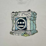 Detailed close of a graphic illustration of a crypt with the Hiero hip-hop logo in the center on a bone t-shirt.