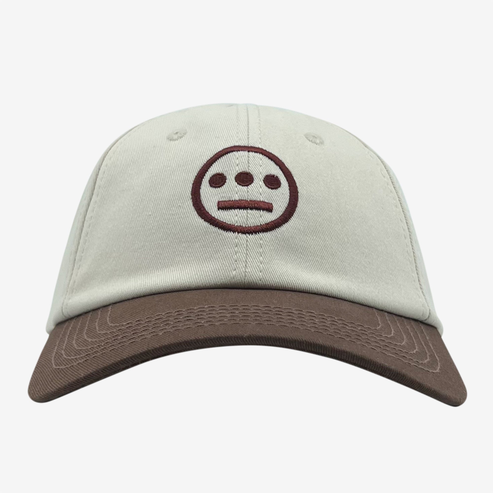 Cream dad hat with brown embroidered Hiero hip-hop crew logo on tan crown with a contrasting brown visor.