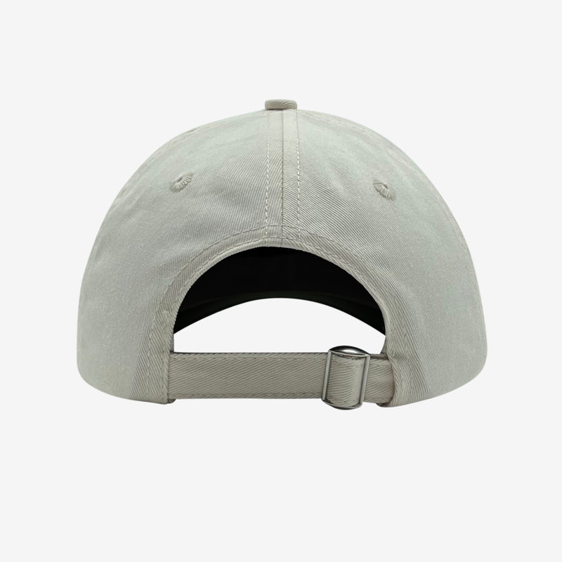 Back of cream dad hat with adjustable strapback.