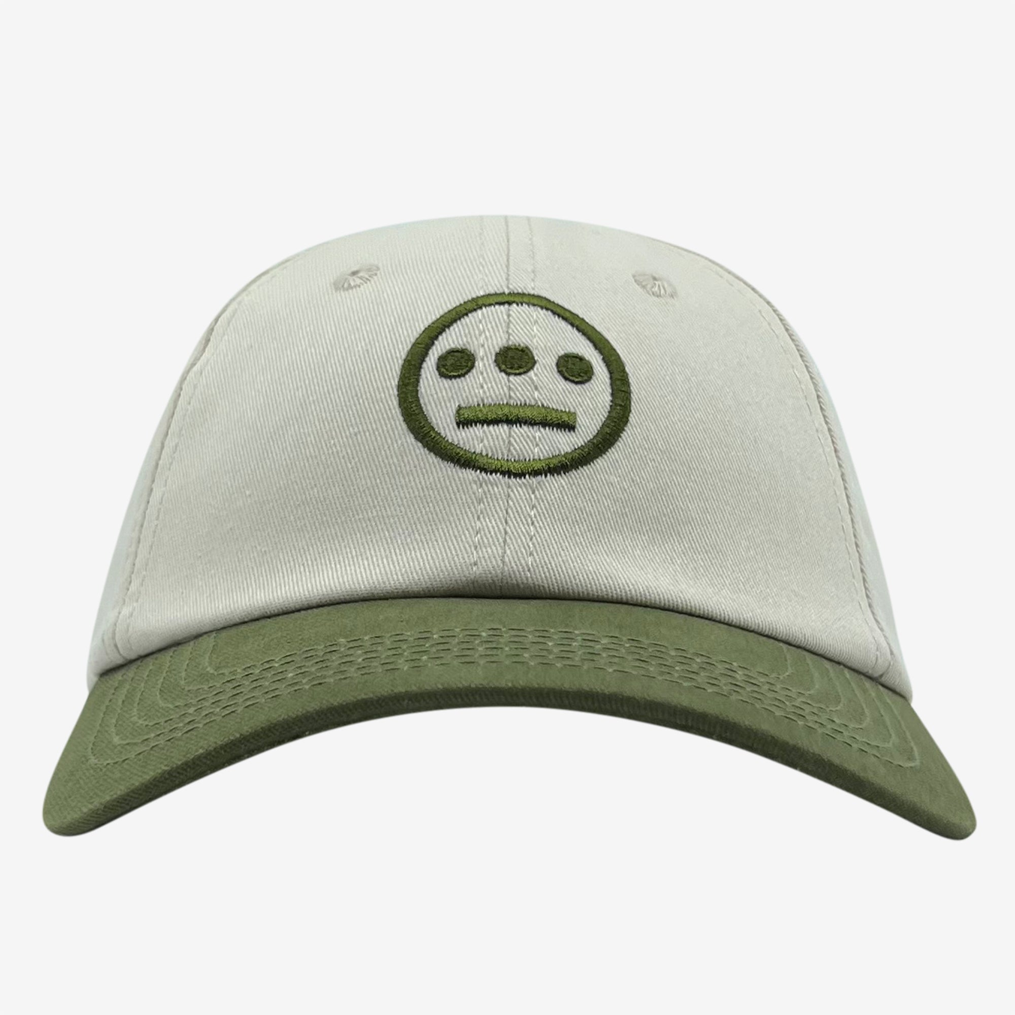 Cream dad hat with olive embroidered Hiero hip-hop crew logo on crown and contrasting olive visor.