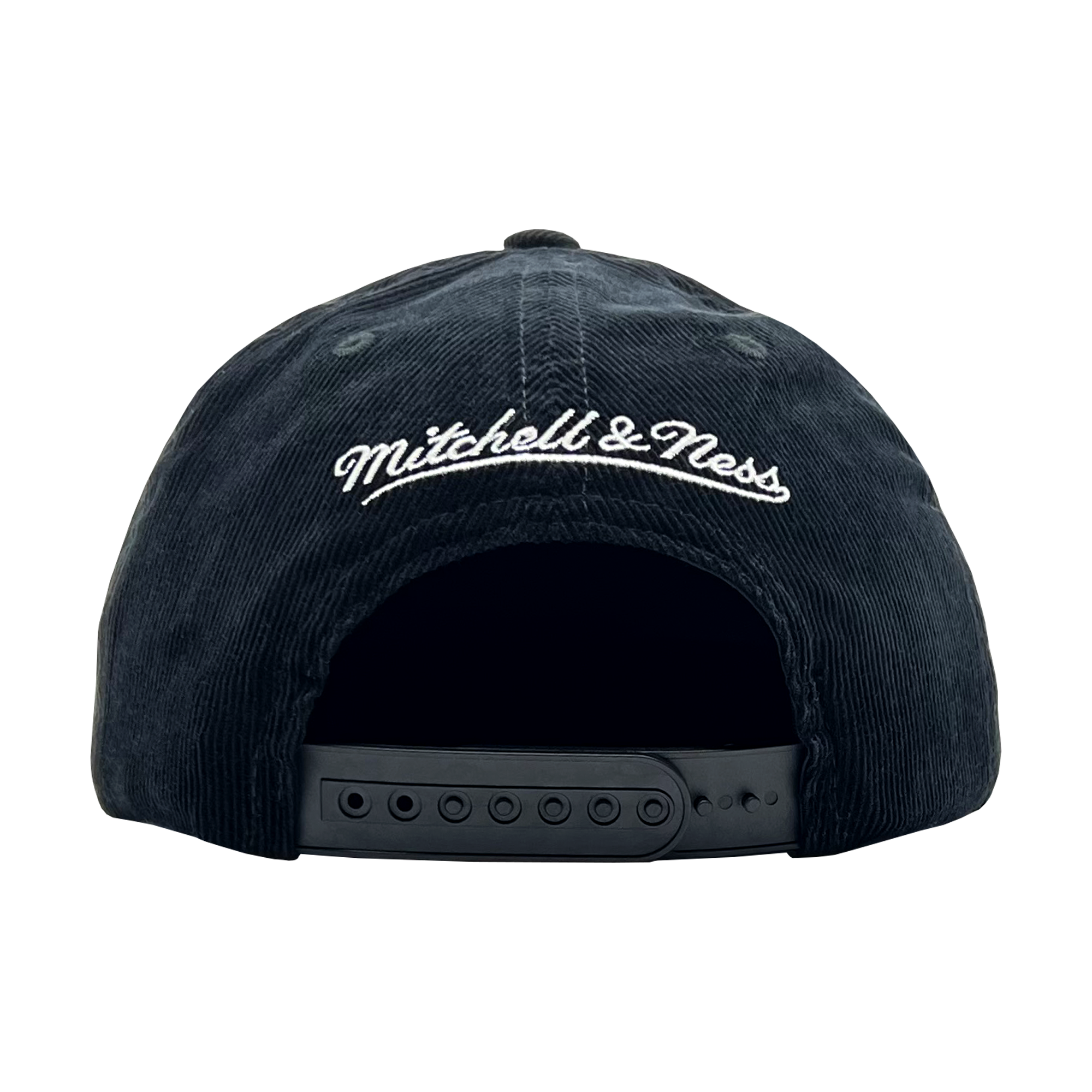 Back view of a black corduroy snapback cap with white embroidered Mitchell & Ness wordmark. 