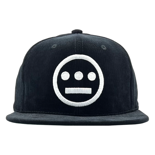 Front view of black Mitchell & Ness snapback corduroy cap with white embroidered Hiero Hip Hop crew logo.