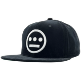 Side view of black Mitchell & Ness snapback corduroy cap with white embroidered Hiero Hip Hop crew logo.