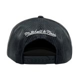 Back view of a black snapback truckers cap with white embroidered Mitchell & Ness wordmark. 