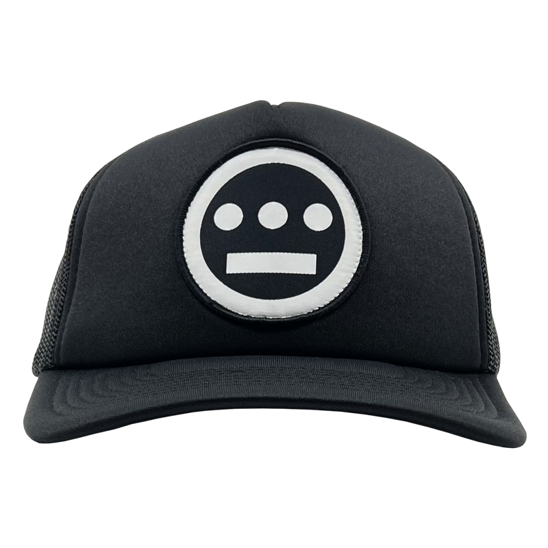 Front view of black Mitchell & Ness snapback truckers cap with white Hiero Hip Hop crew logo.