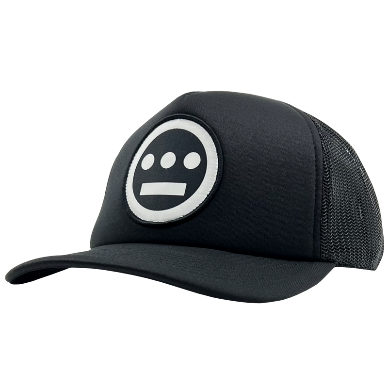 Side view of black Mitchell & Ness snapback truckers cap with white Hiero Hip Hop crew logo.