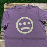 Mauve t-shirt with white Hieroglyphics Hip-Hop logo on center chest on a wood picnic table.
