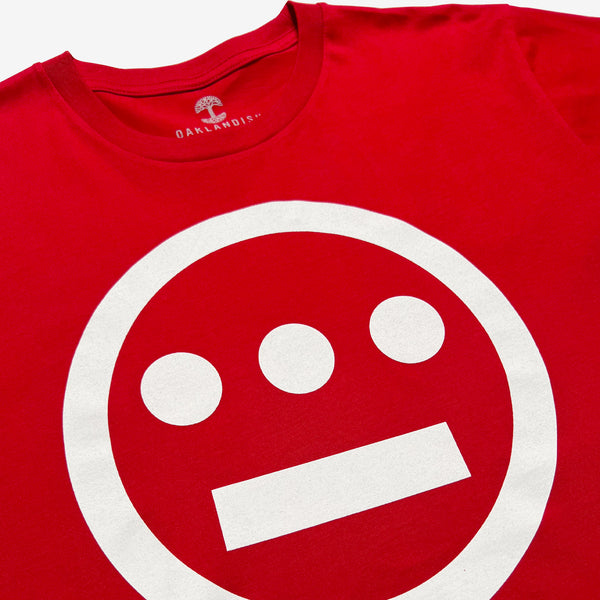 Close up of white Hieroglyphics Hip-Hop logo on a red t-shirt. 