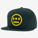 Green cap with embroidered gold Hieroglyphics hip-hop logo on the crown. 