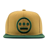 Front view of two-toned brown Mitchell & Ness snapback cap with green embroidered green Hiero Hip Hop crew logo & green visor.