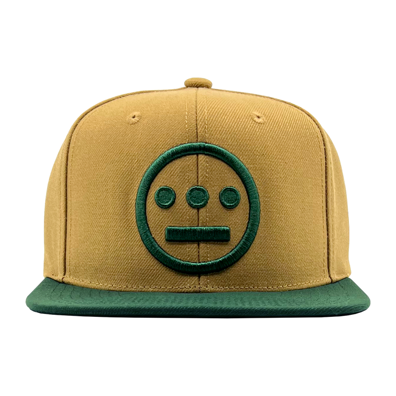 Front view of two-toned brown Mitchell & Ness snapback cap with green embroidered green Hiero Hip Hop crew logo & green visor.