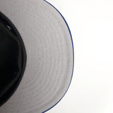 Grey underside of the bill on a New Era cap.