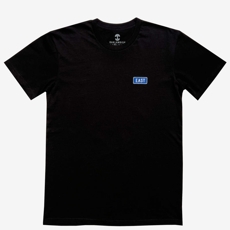 Black t-shirt with word East in blue highway style graphic on breast.