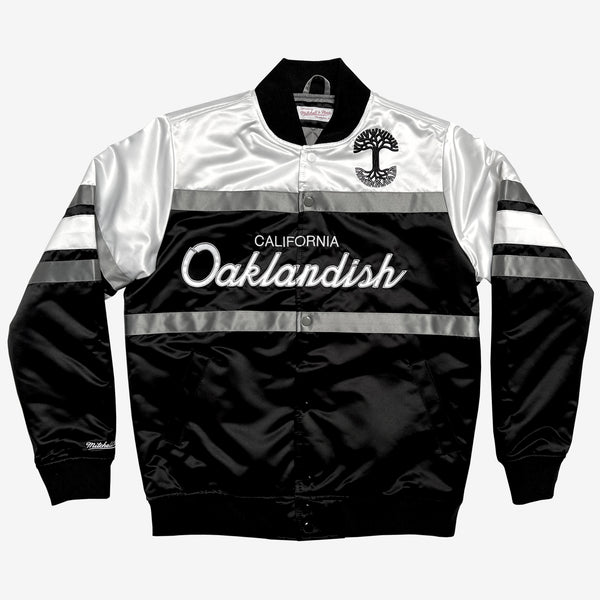 Black, white, and grey striped, collared satin jacket with script California Oaklandish wordmark and Oaklandish tree logo.