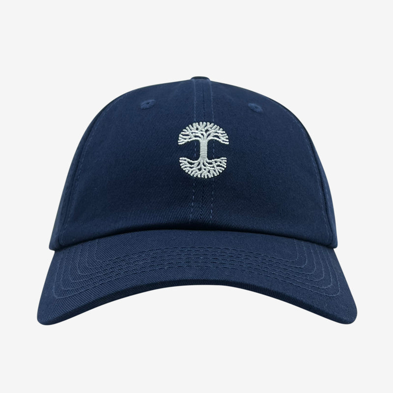 Navy cotton dad hat with micro white embroidered Oaklandish tree logo.