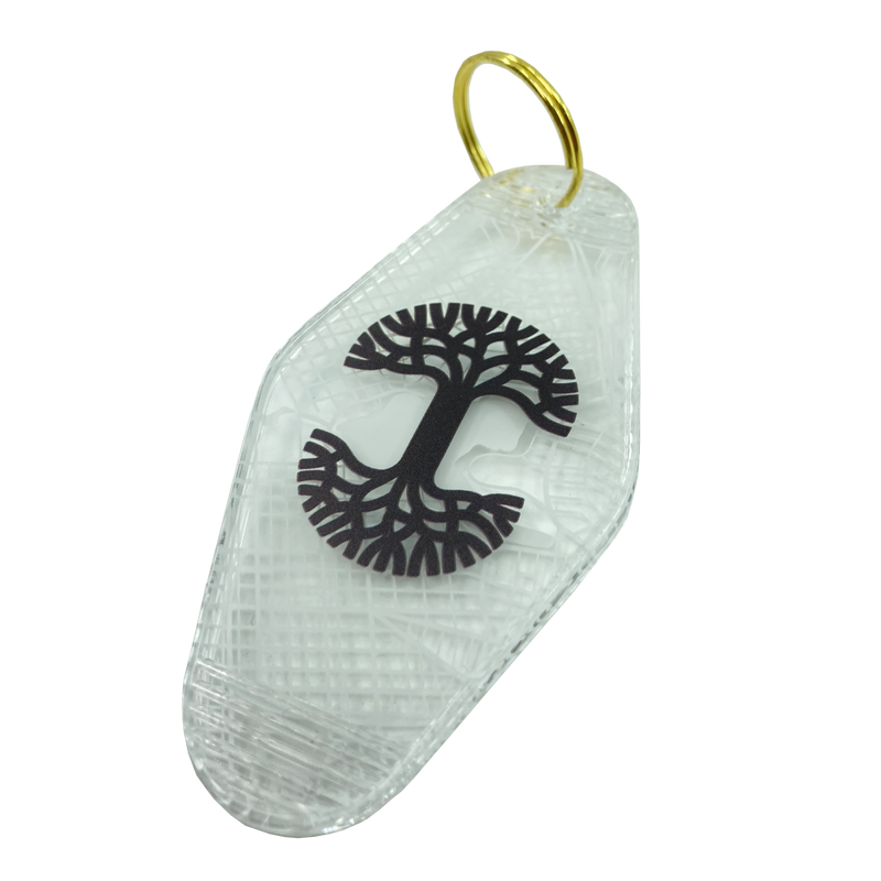 Translucent white motel-style keychain with black Oaklandish Logo and Oakland aerial view map.