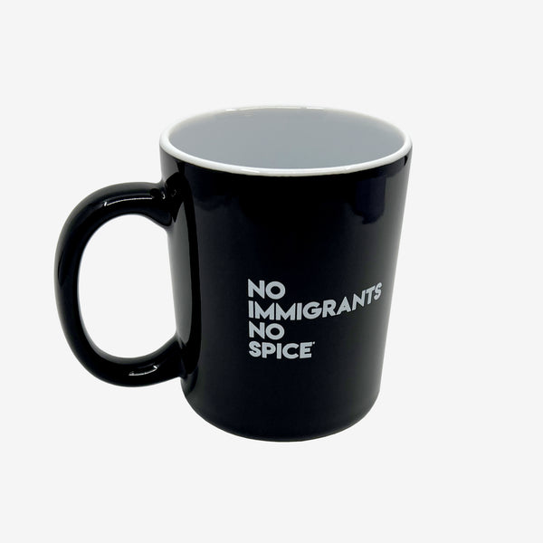 Glossy finish black ceramic coffee mug with white NO IMMIGRANTS NO SPICE wordmark and white inside.