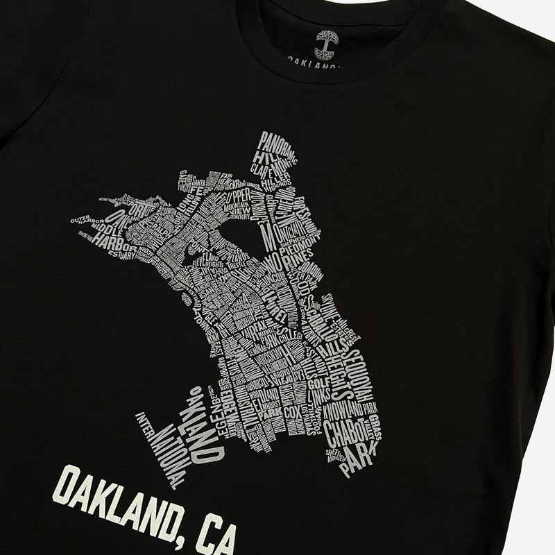 Close up of Oakland neighborhood map  with Oakland Nation & Oakland CA wordmarks on black t-shirt.