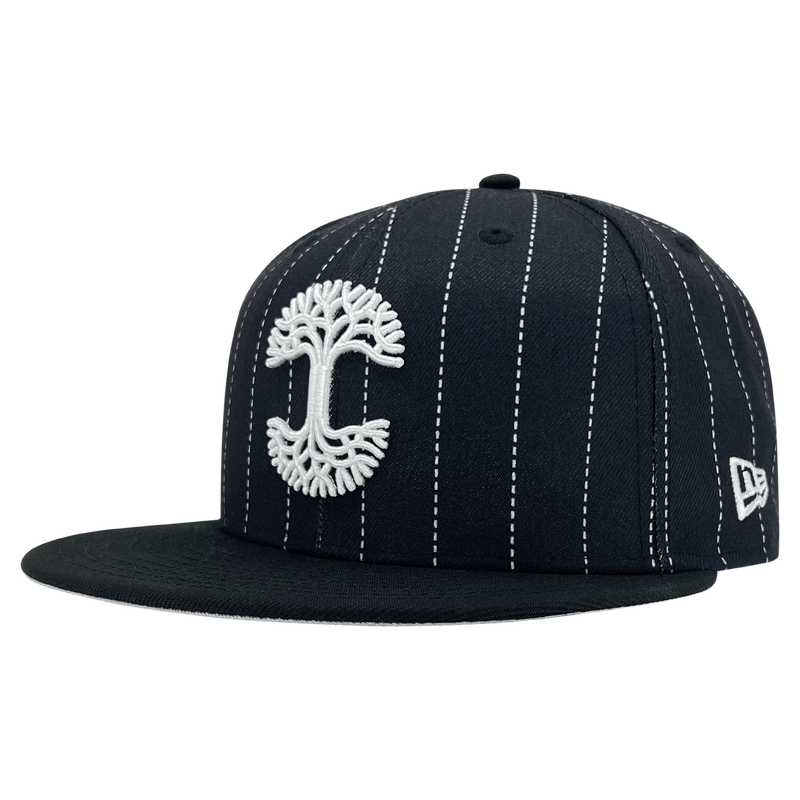 New Era 59FIFTY black pinstripe fitted hat with white embroidered Oaklandish tree logo-angled to show New Era logo on left wear side.