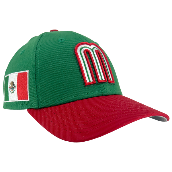 Side angle green New Era adjustable cap with red and white Mexican baseball M patch, red bill, and Mexican flat on left wear side.