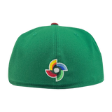 Backside view of green New Era fitted cap with embroidered world baseball classic logo.