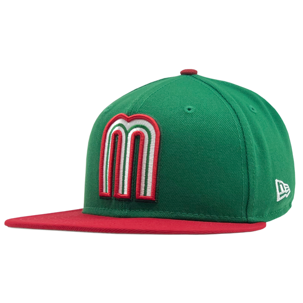 Side view of green New Era fitted 59FIFTY CAP with red and white Mexican baseball M patch and red bill.
