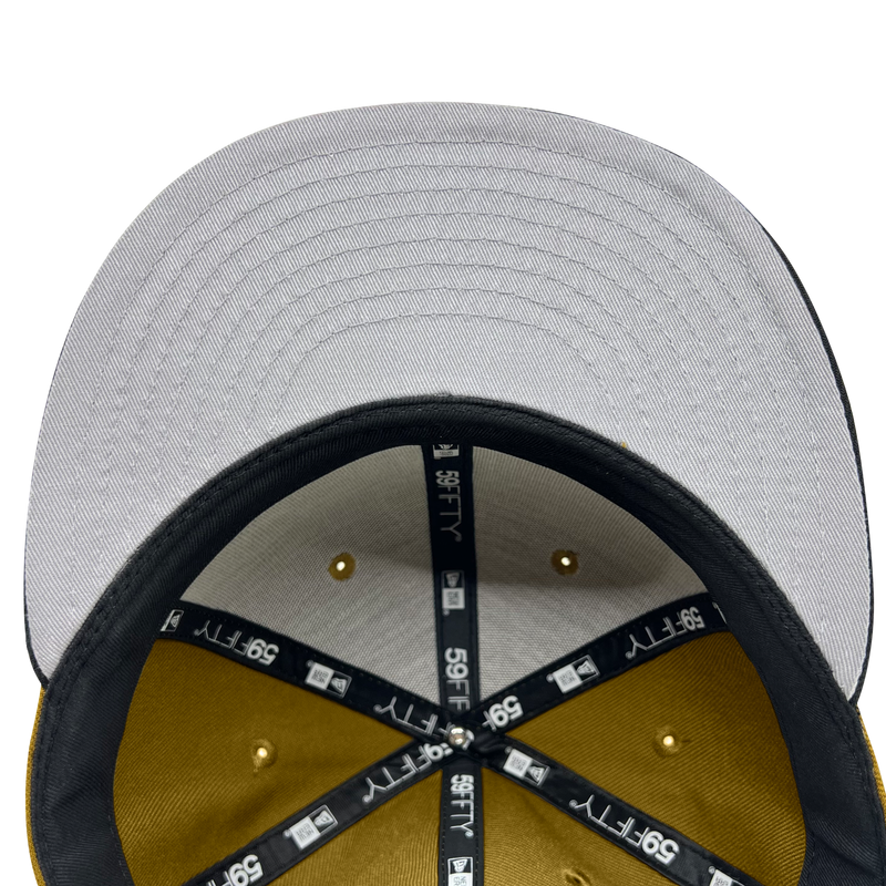 Inside crown view of New Era 9FIFTY fitted cap with black New Era taping and grey under visor.