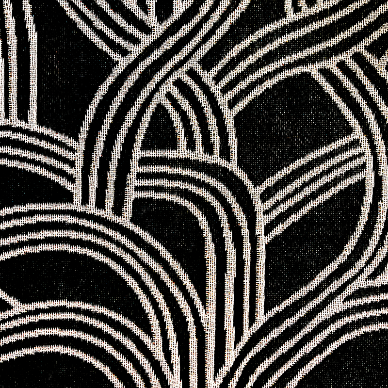 Detailed close-up of pattern inside the Oaklandish tree logo on a black throw blanket.