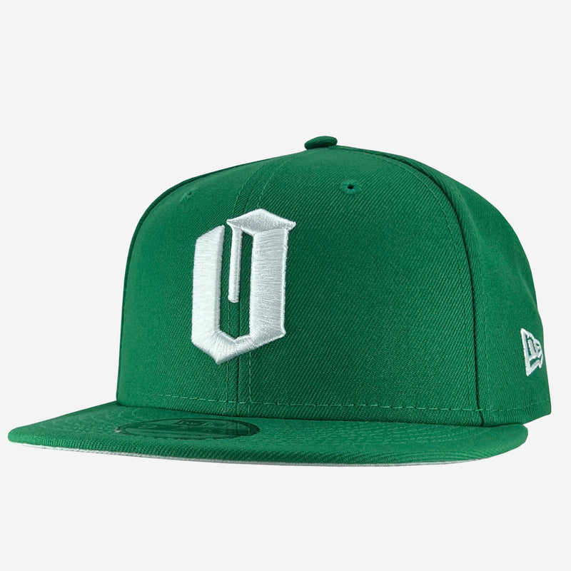 New Era 9FIFTY green cap with white embroidered O. Tilted to see white embroidered New Era logo on left wear side. 