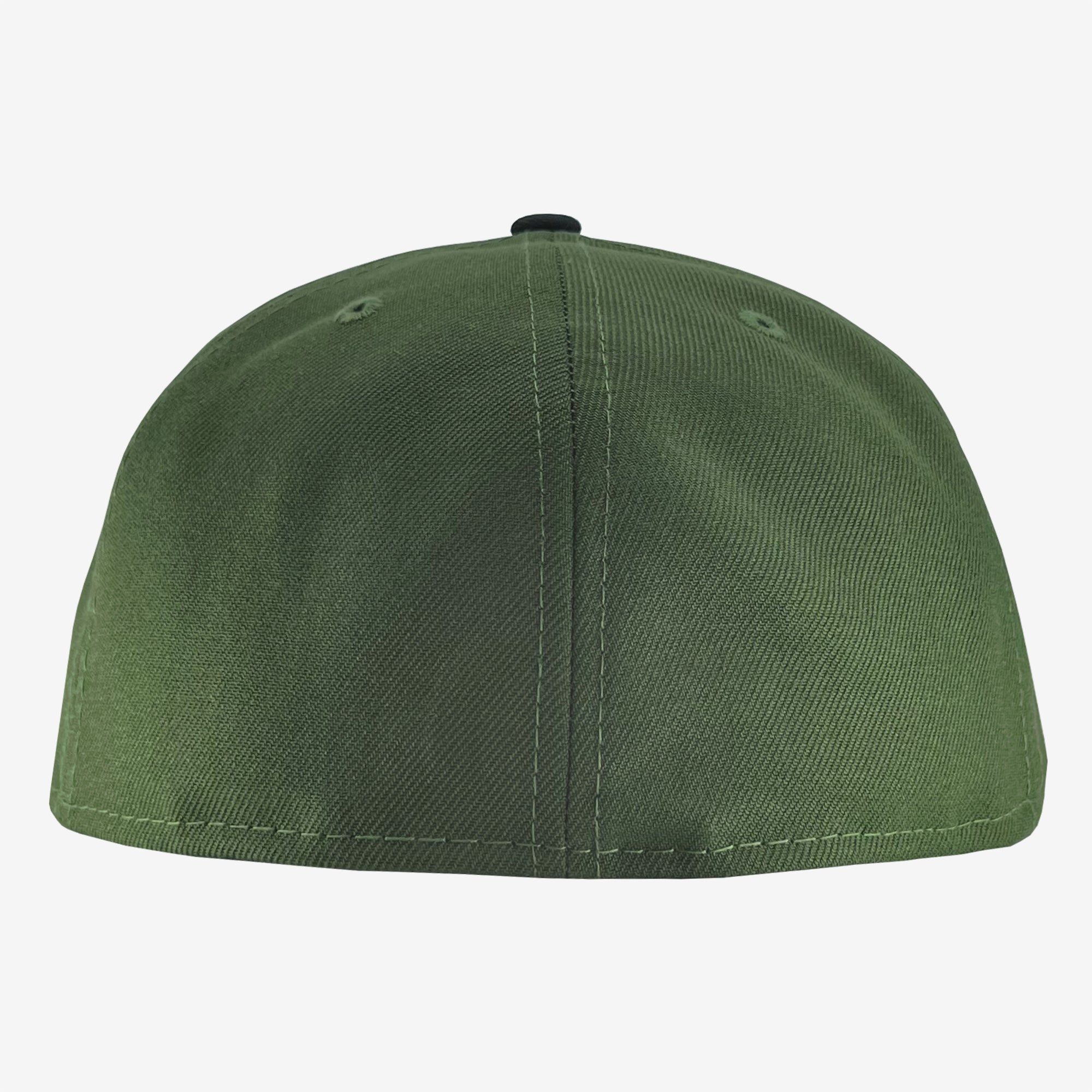 The backside of a green fitted cap. 
