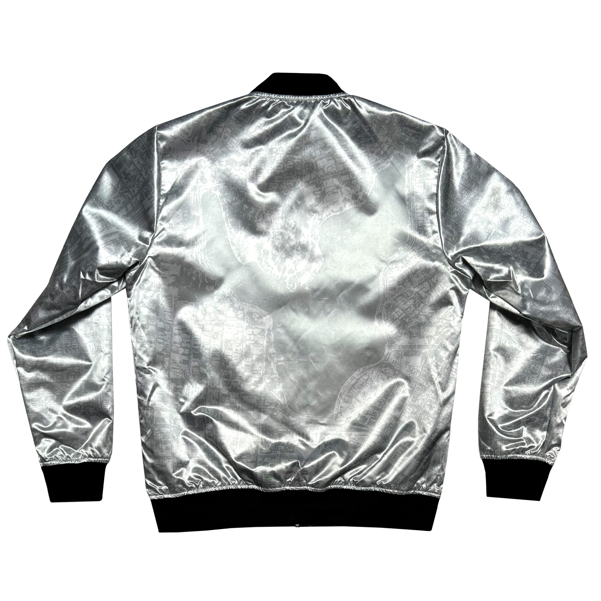 The back of a silver reverse side of a satin jacket, imprinted with an aerial map of Oakland with black ribbing at the collar, cuff, and waistband.