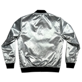 The back of a silver reverse side of a satin jacket, imprinted with an aerial map of Oakland with black ribbing at the collar, cuff, and waistband.