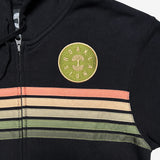 Detailed close up of green, orange and yellow stripes and full-circle Oaklandish logo black zip up hoodie..