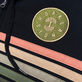 Detailed close up of Oaklandish logo patch on black hoodie with green, orange and yellow stripes.