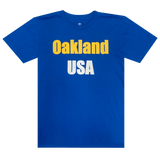 Flat image of Royal t-shirt with 'Oakland USA' wordmark across chest.