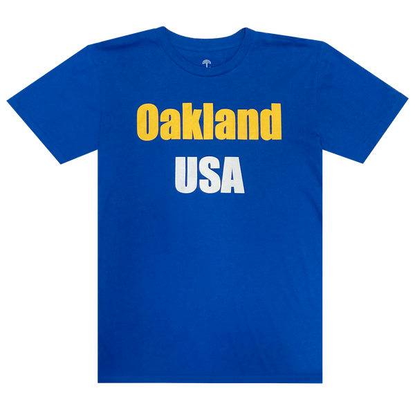 Flat image of Royal t-shirt with 'Oakland USA' wordmark across chest.