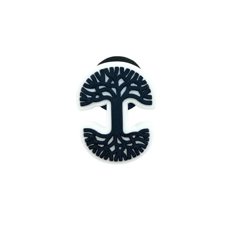 Shoe or clog charm of Oaklandish tree logo in black and white.