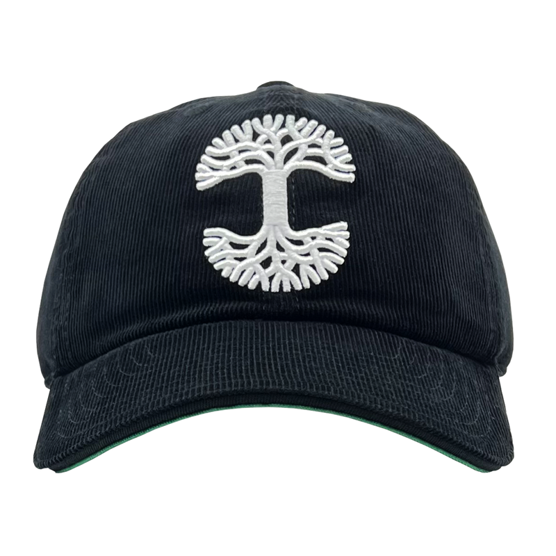 Front view of black Mitchell & Ness snapback truckers cap with white embroidered Oaklandish tree logo.