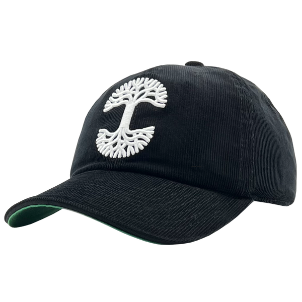 Side view of black Mitchell & Ness snapback truckers cap with white embroidered Oaklandish tree logo.