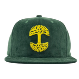 Front view of a green corduroy Mitchell & Ness cap with yellow Oaklandish with embroidered yellow Oaklandish tree logo.