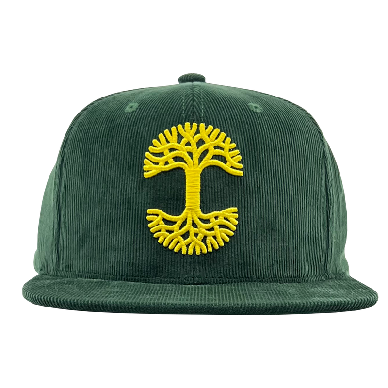Front view of a green corduroy Mitchell & Ness cap with yellow Oaklandish with embroidered yellow Oaklandish tree logo.