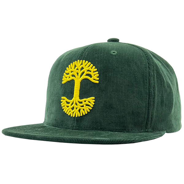 Side view of a green corduroy Mitchell & Ness cap with yellow Oaklandish with embroidered yellow Oaklandish tree logo.
