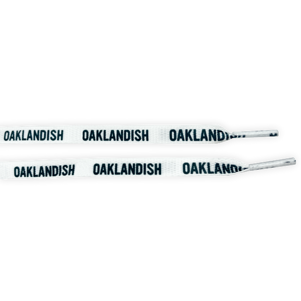 Flat white shoelaces with black Oaklandish wordmark on repeat.